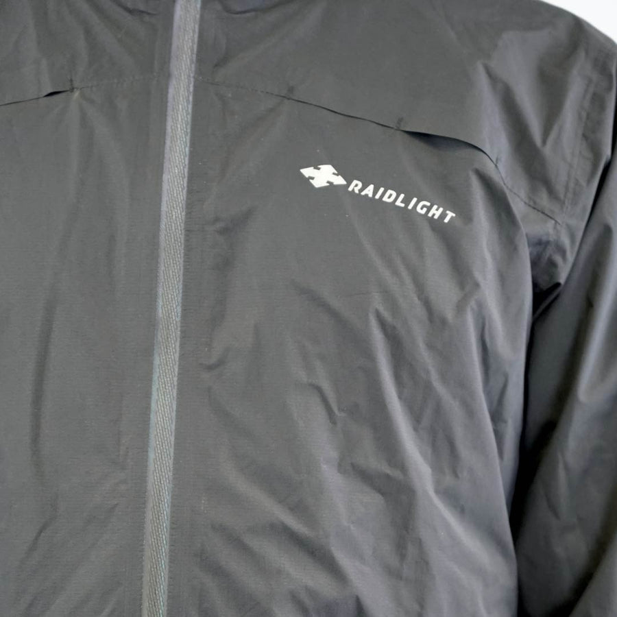 Raidlight Top Extreme Ultra MP+ Heren in zwart – detail reflecterende middenrits en logo