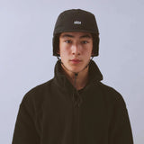 Vaga Padded Hiker Cap in black – worn, front view with ear flaps down