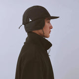 Vaga Padded Hiker Cap in black – worn, side view with ear flaps down