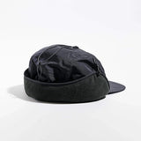 Vaga Padded Hiker Cap in black – rear angle view with fleece band and ear flaps up