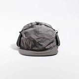 Vaga Padded Hiker Cap in grey – front view with ear flaps fastened up