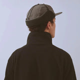 Vaga Padded Hiker Cap in grey – worn, rear view with ear flaps up