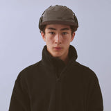 Vaga Padded Hiker Cap in grey – worn, front view with ear flaps up